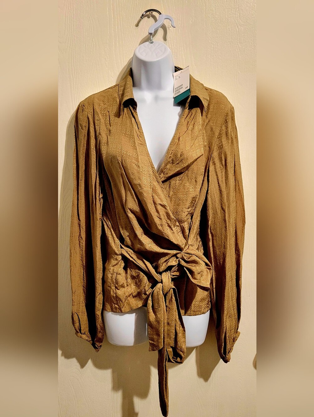H&M Conscious collection patterned tie-waist wrap blouse.